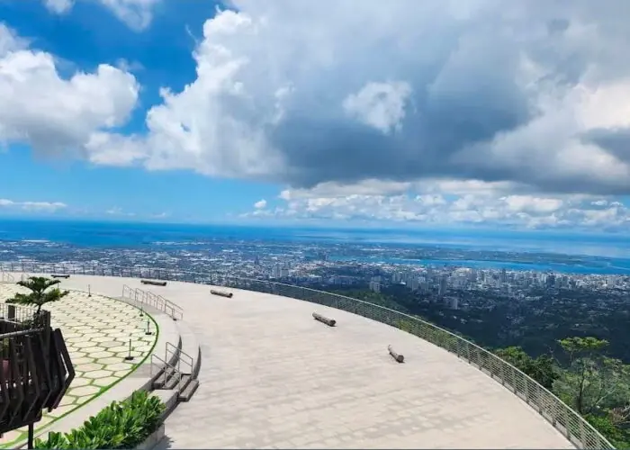Panoramic view of Cebu City and the coastline from the viewing deck at Tops Cebu in Busay, Cebu, Philippines.