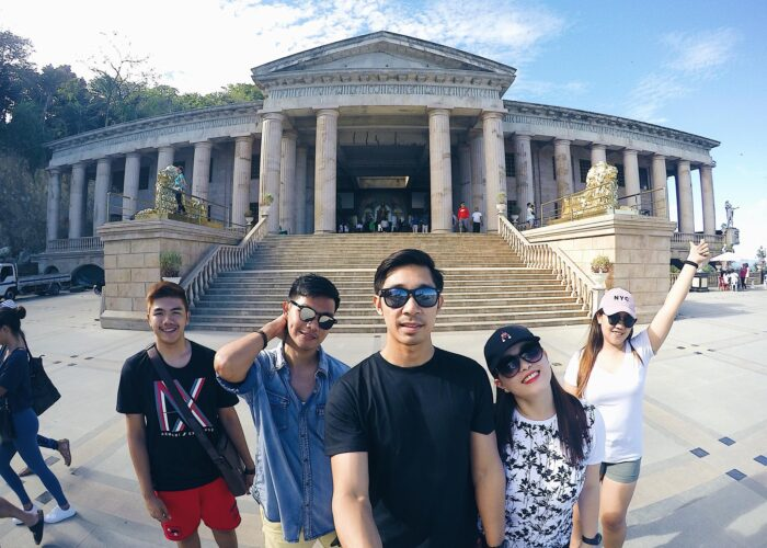 Group of tourists posing in front of the Temple of Leah